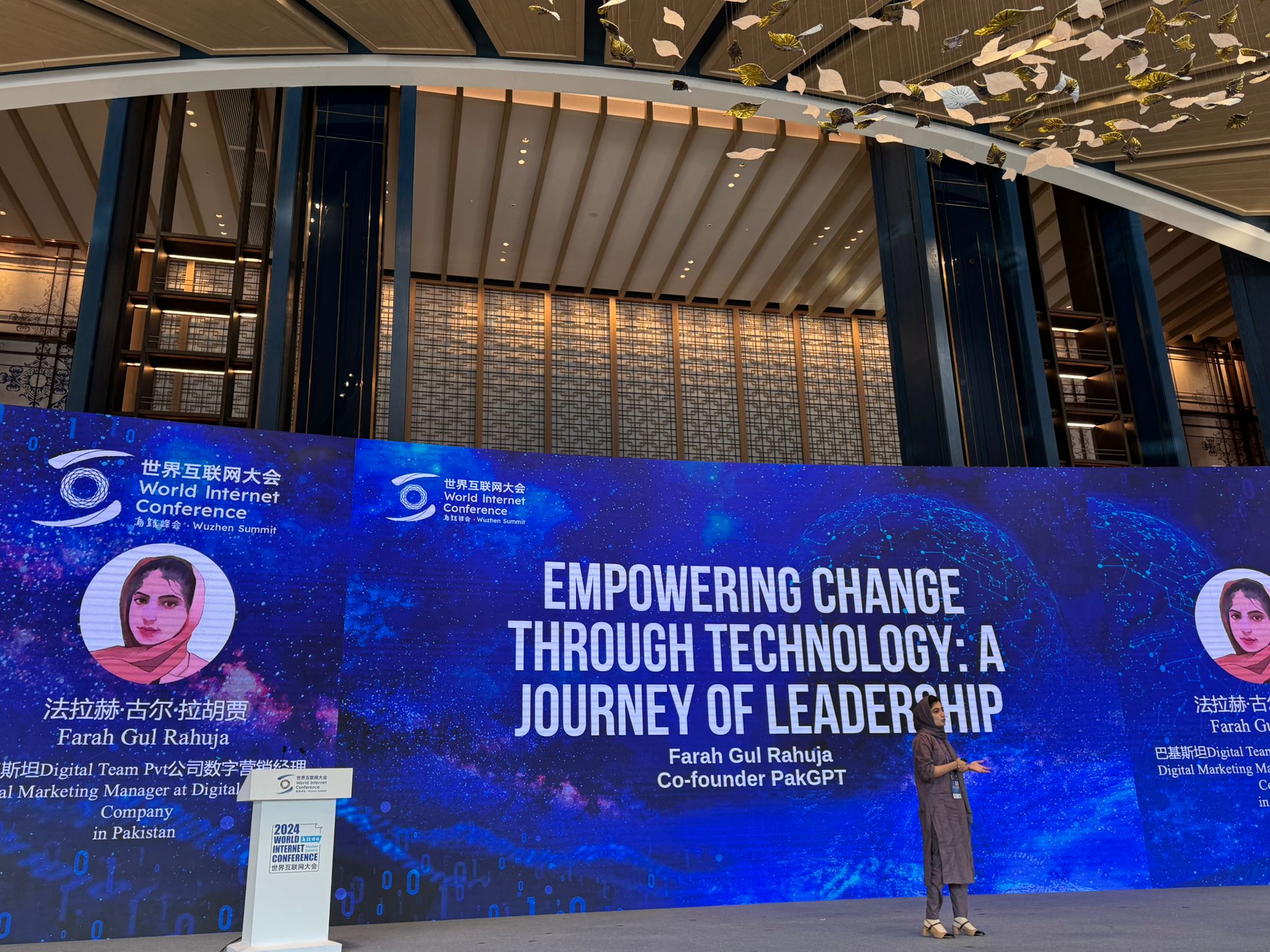 Medals and certificates laying on a red cloth at award ceremony for outstanding achievement